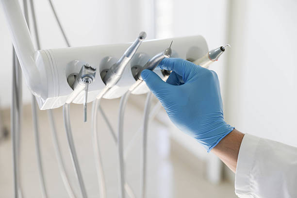 Professional Root Canal Treatment technician working in Muskegon, MI